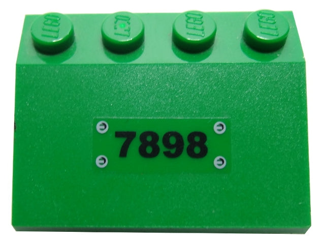 Green LEGO slope brick 3x4 with black '7898' number and rivet pattern