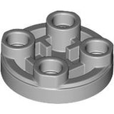 Gray LEGO 3567 Round 2x2 Inverted Tile with four visible anti-stud connections on its top surface.