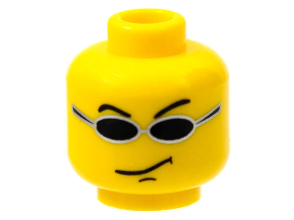 Yellow LEGO minifigure head with small black sunglasses, raised eyebrows, and a smirk mouth pattern.