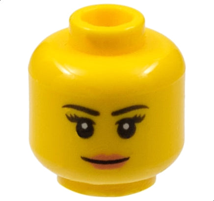Yellow LEGO minifigure head with female face: thin black eyebrows, long eyelashes, nougat lips, and a subtle grin.