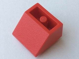 A single red LEGO 3660old inverted 45 2x2 slope brick with a solid round bottom tube, viewed from above.