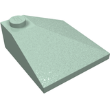 Light teal LEGO 3x3 double convex corner slope brick (part 3675) with a single stud.