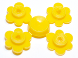 Four bright yellow LEGO small flower pieces arranged around a central round yellow sprue piece on a white background.
