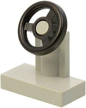 A light gray LEGO 3829c01 Vehicle, Steering Stand 1 x 2 with an attached black steering wheel.