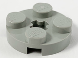 Light grey LEGO round 2x2 plate with four studs and a star-shaped axle hole in the center.