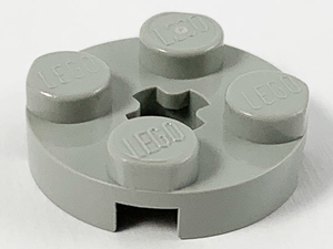 Light grey LEGO round 2x2 plate with four studs and a star-shaped axle hole in the center.
