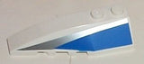 White LEGO 6x2 left wedge piece with a blue and silver diagonal pattern on its side, showing two studs on top.