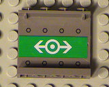 Gray LEGO panel 1x4x3 with a green sticker featuring a white train logo showing opposing arrows and a central circle.