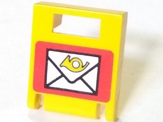 Yellow LEGO 2x2x2 container door with slot, featuring a white envelope and yellow horn symbol on a red background pattern.