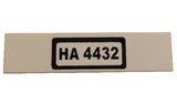 LEGO 1x4 tan tile featuring a black-bordered white sticker with the text 'HA 4432'.