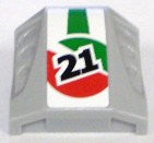 LEGO light gray curved 2x2 slope brick with white sticker, black '21' on red and green circle, and green stripe.