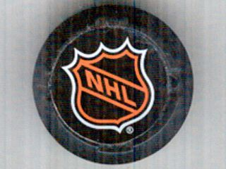 Large LEGO sports hockey puck with the orange and white NHL shield logo pattern in the center.