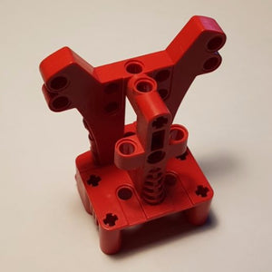 Red LEGO 44849 Sports Hockey Player Body part, a plastic building toy piece with various pinholes and axle connections.