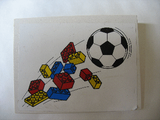 White LEGO slope sticker with a black and white soccer ball and scattered red, blue, and yellow LEGO bricks in motion.