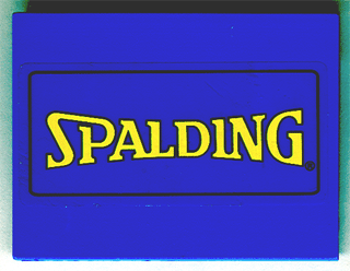 Blue LEGO Slope 10 6x8 brick with a yellow Spalding logo pattern (sticker).