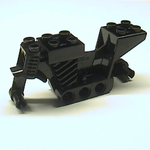 A black LEGO 4 Juniors Motorcycle Chassis 2 x 8 x 3 part, featuring studs on top and pin holes for attachments.
