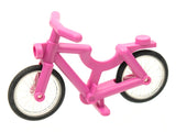 Pink LEGO bicycle (4719c01) with handlebars, trans-clear wheels, and black tires on a white background.