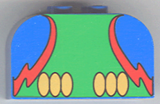 LEGO curved slope 4x2x2 part with parrot body pattern. Green center, blue sides, red lightning-like designs, and yellow ovals.