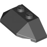 Close-up of a black LEGO 47759 Wedge 2 x 4 Triple element with two studs on top.