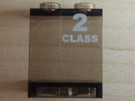 A transparent brown LEGO panel 1x2x2 with hollow studs, featuring white '2 CLASS' text printed on it.
