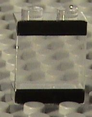 Clear LEGO Panel 1x2x2 with black stripes pattern on top and bottom.