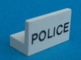 White LEGO panel 1x2x1 with 'POLICE' pattern printed in black, on a blue background.