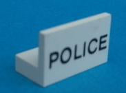 White LEGO panel 1x2x1 with 'POLICE' pattern printed in black, on a blue background.