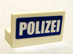 Cream LEGO panel 1x2x1 with 'POLIZEI' in white text on a blue rectangular sticker. Part 4865pb014, Set 7741.