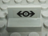 White LEGO 4865pb021 Panel 1x2x1 with a black train logo pattern sticker featuring two arrows pointing away from a central circle.