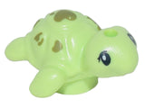 Light green LEGO baby turtle, Friends style, with olive green spots and black eyes.
