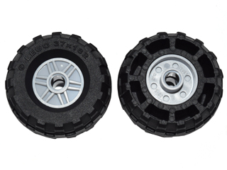 Two LEGO 55981c04 wheels with black 37x18R tires. Front view shows silver hubcap with fake bolts; back view shows wheel structure.