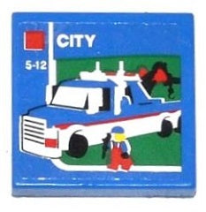 Blue LEGO 2x2 tile with sticker featuring a blue and white tow truck, a minifigure, 'CITY' text, and '5-12'.