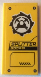 Yellow LEGO 2x4 tile with a black and white print featuring a cogwheel, helmet, pickaxes, and 'SPLITTER 500 PSI' text.