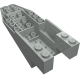 Light gray LEGO 6058 Cockpit 11x4x2 2/3 Inverted Slope brick with studs and an open rear section.
