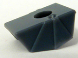 Close-up of a dark gray LEGO minifigure pauldron armor piece, model 61190b, with a faceted front and hole on top.