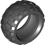 Dark gray LEGO tire 68.7 x 34 R with chunky, block-patterned tread, shown at an angle revealing the inner rim.