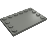 A gray LEGO 6180 Modified 4x6 Tile with studs on its edges and a smooth, flat central area.