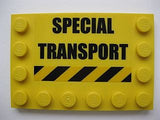 LEGO 6180pb033 yellow 4x6 tile with 'SPECIAL TRANSPORT' text and black and yellow hazard stripes.