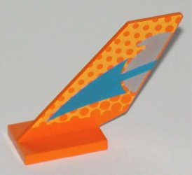 Orange LEGO tail fin with a blue arrow, silver accents, and an orange dot to honeycomb fade pattern.