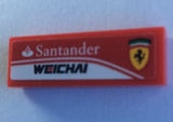 Red LEGO 1x3 tile with white Santander and WEICHAI logos, and a yellow Ferrari shield logo on the right.