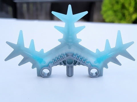 LEGO Bionicle Weapon Ice Shield Half 64266pb01, trans-light blue marbled pattern with gray connectors.