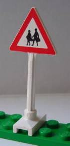 LEGO 649pb04 road sign with red triangle border and two black pedestrian silhouettes on a white pole attached to a green baseplate.