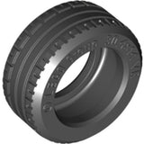Dark gray LEGO Tire 30.4 x 14 VR, part 6578, with tread pattern and 'LEGO Group' molded on the sidewall.