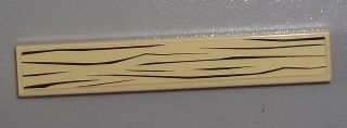 Tan LEGO 1x6 tile with a dark brown wood grain pattern printed on its surface.
