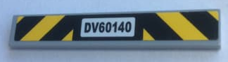 LEGO 1x6 light gray tile with black and yellow danger stripes sticker and 'DV60140' text