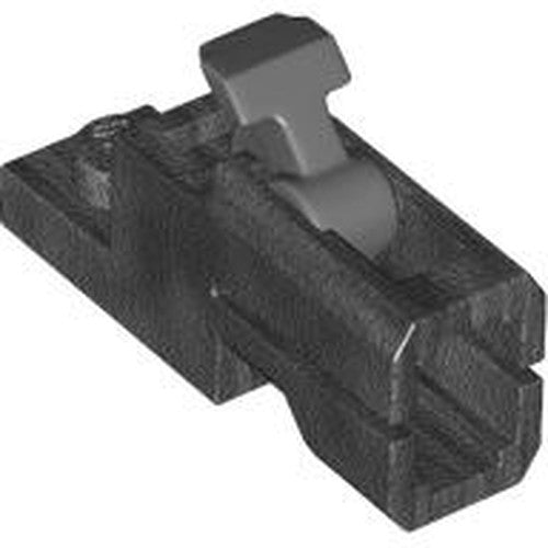 Dark grey LEGO 1x2 projectile launcher, also known as mini blaster or tile shooter, with a light grey trigger.