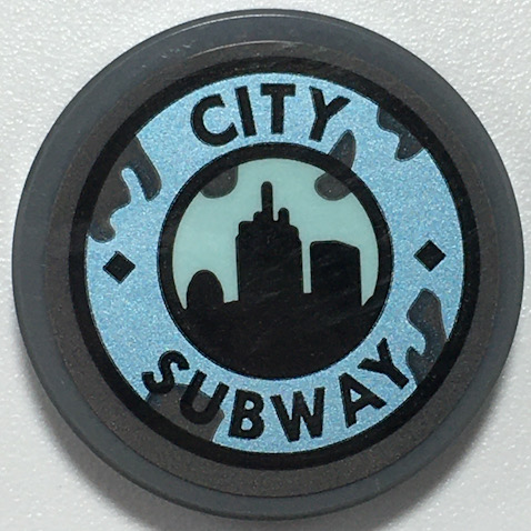 LEGO 14769pb453 round tile, black 'CITY SUBWAY' text, black city skyline silhouette on light aqua circle, metallic light blue.