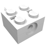 White LEGO 2x2 brick with four studs on top and a circular Technic pin connection hole on one side.