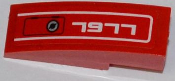 Red LEGO curved 3x1 slope, with white panel outline, circular detail, and mirrored '7977' print.