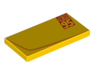 Yellow LEGO 2x4 tile with a curved line and red 'RUSTEZE RACING CENTER TEAM 95' pattern on the right side.